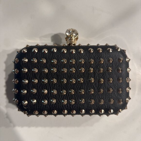 Cesca Handbags - Black Studded Clutch with Skull Charm & Gold Hardware